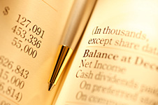 balance sheet and pen
