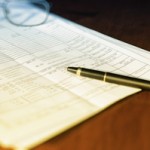 financial report and pen
